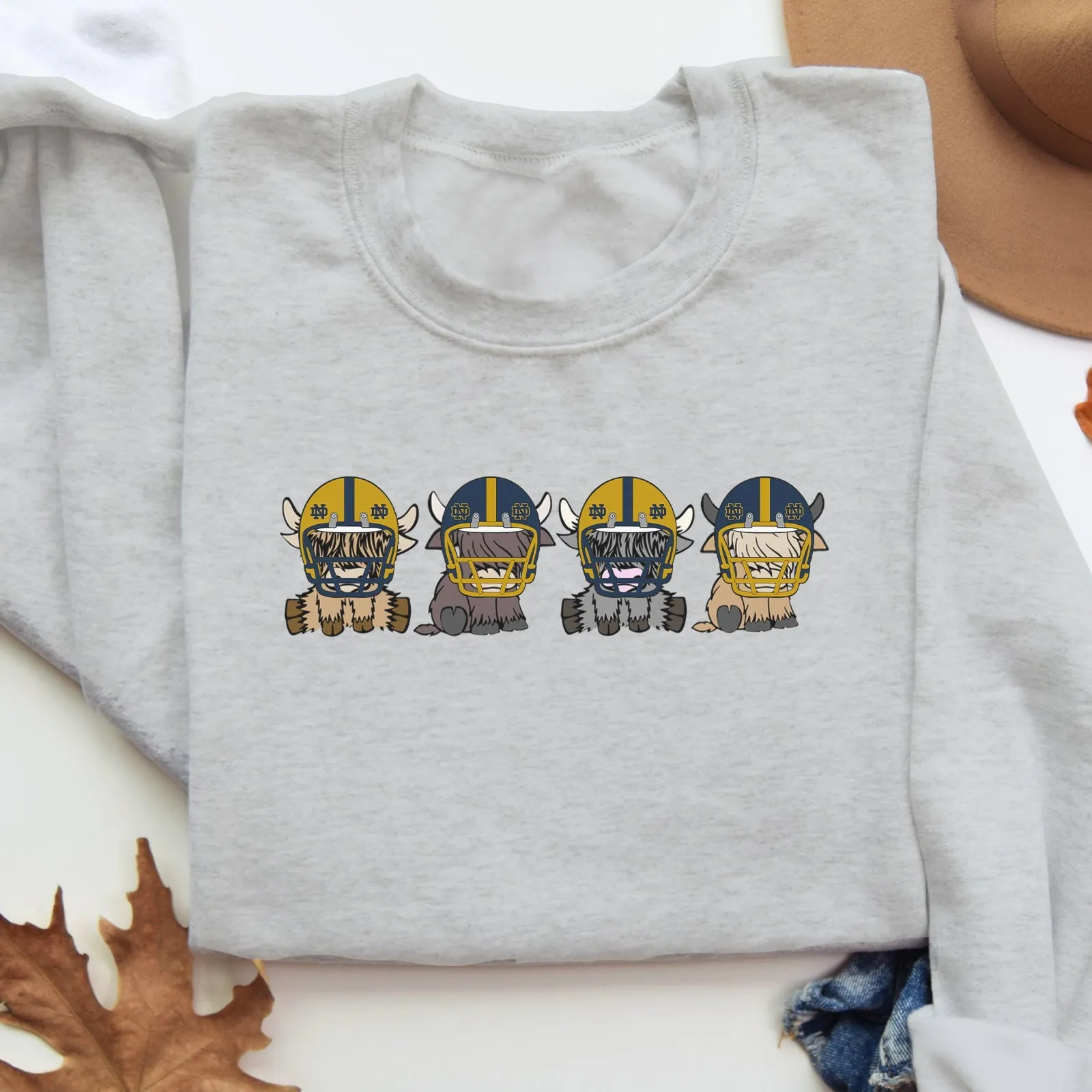 Notre Dame Fighting Irish Football Highland Cow Football Team Football Lovers Gift Unisex Crewneck Hoodie Sweatshirt
