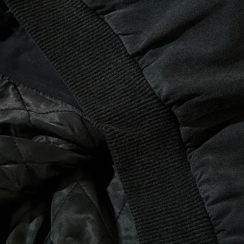 Washed denim quilted lining bomber